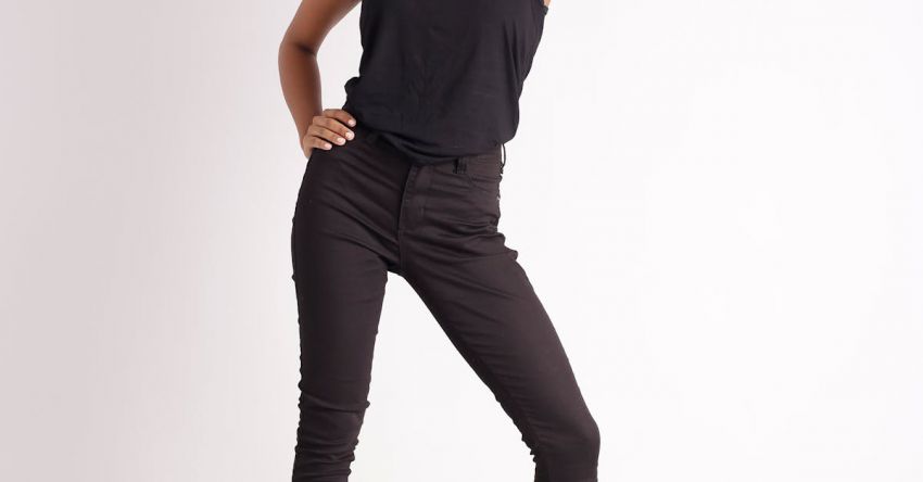 Hair Fashion - A woman in black tank top and black jeans