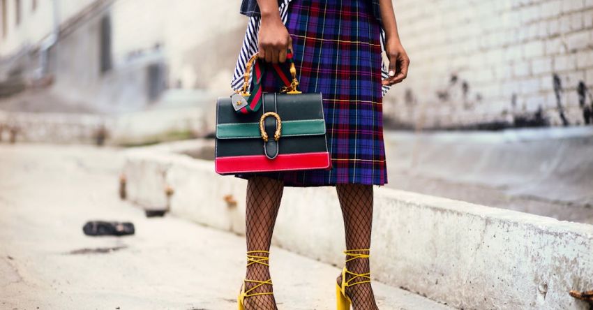 Fashion Week - Woman Holding Leather Handbag