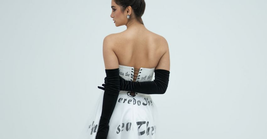 Voluminous Updo - A Woman in a Black and White Dress