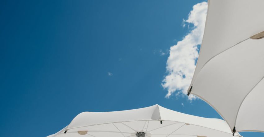 Heat Protectant - Blue Sky over White Umbrellas