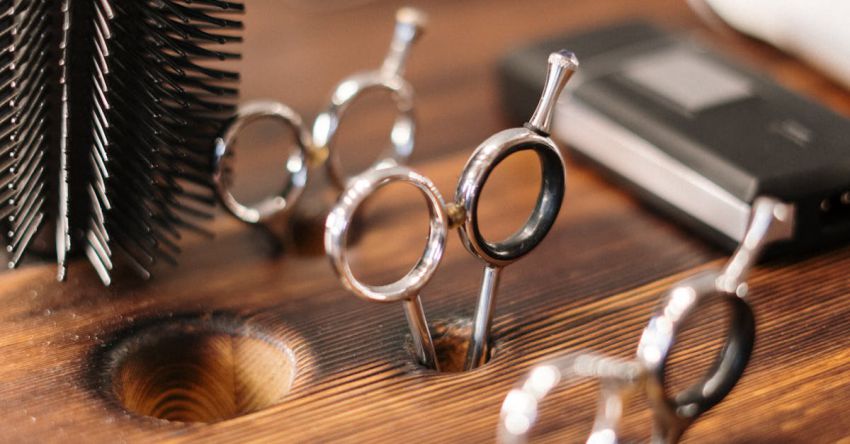 Hair Tools - Silver and Black Skeleton Key on Brown Wooden Table